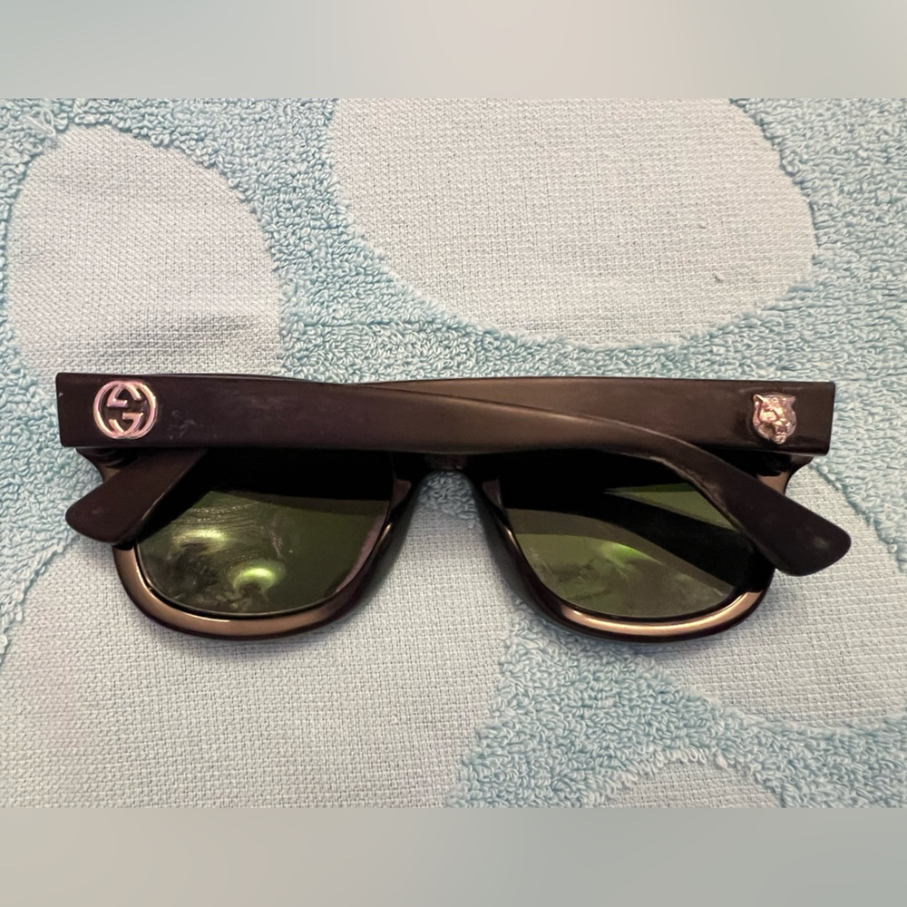 Gucci sunglasses GG and silver tiger head on temples black frames Guc